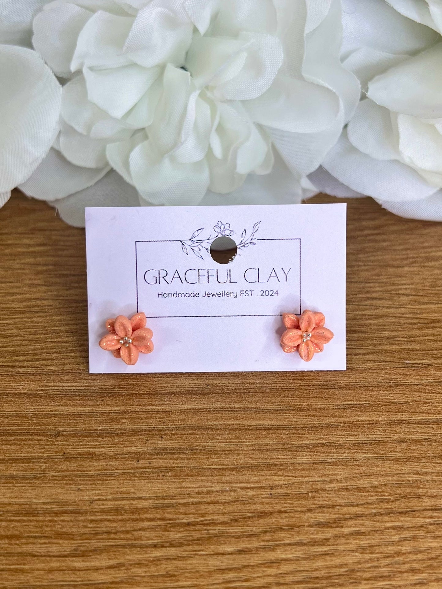 Peach glitter flower studs