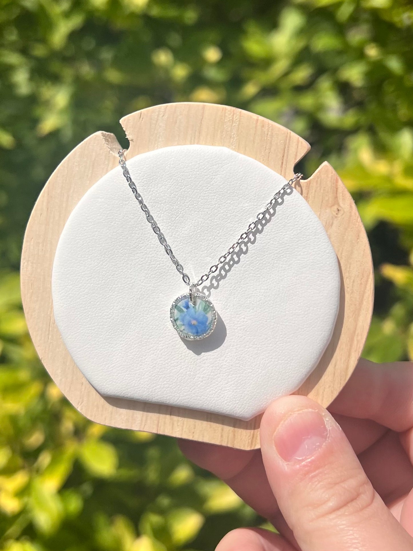 Floral silver circle necklace