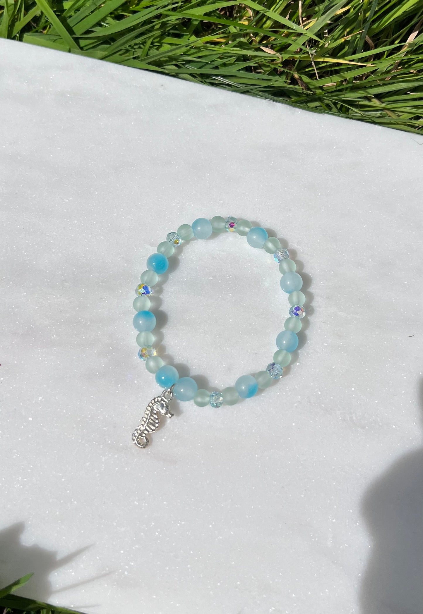 Pastel blue stretch bracelet with Seahorse Charm