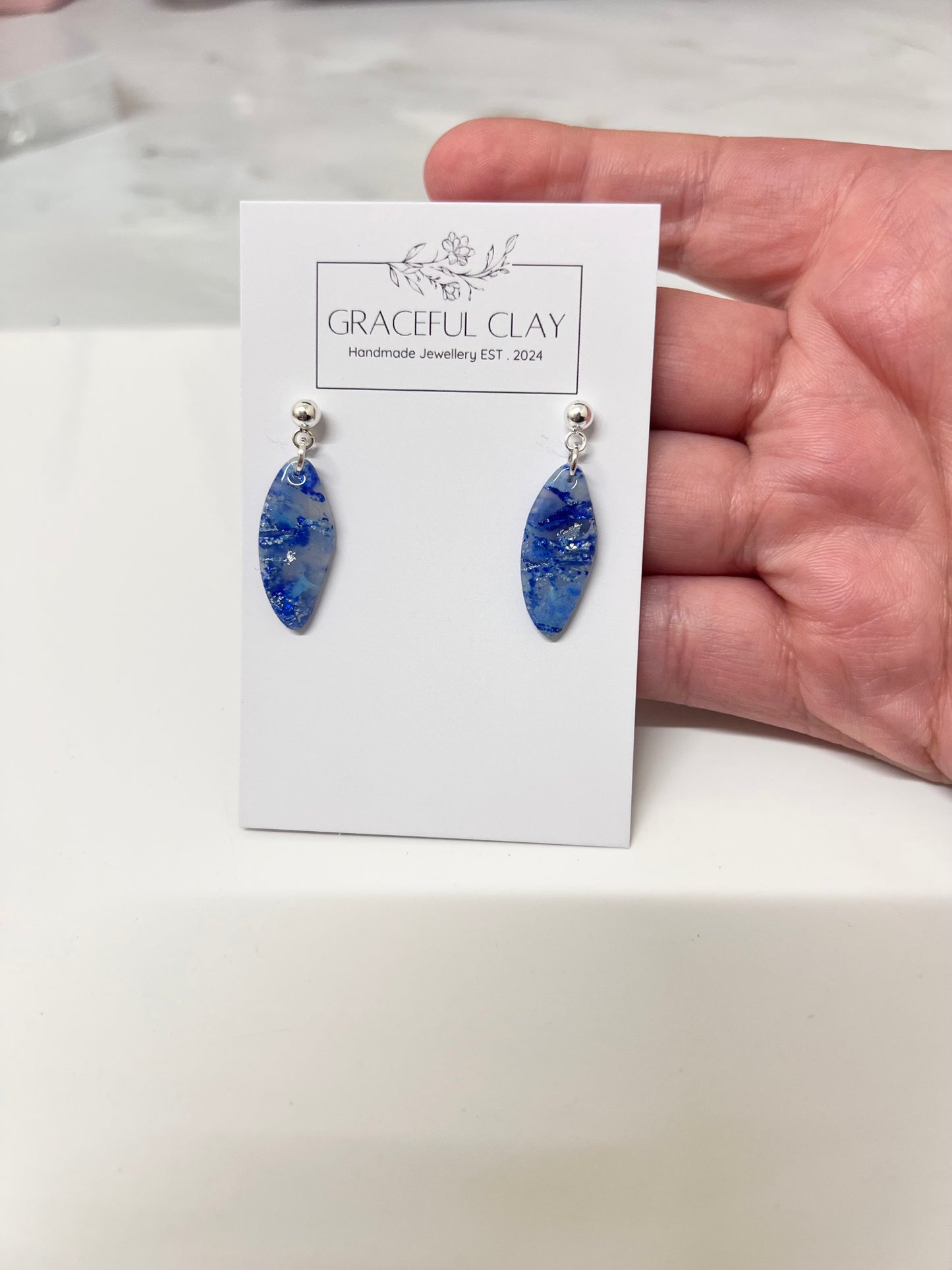 Blue marble drop earrings