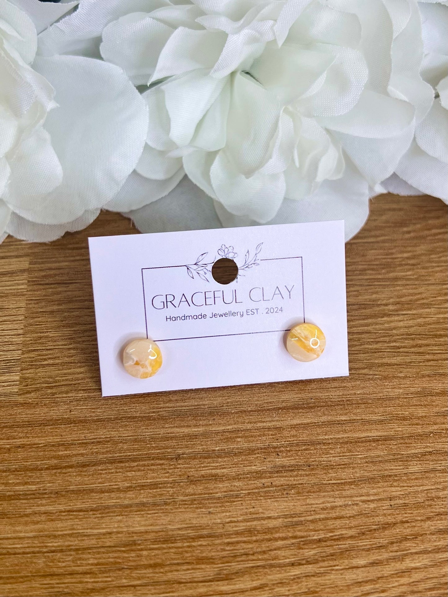 Yellow marble circle studs