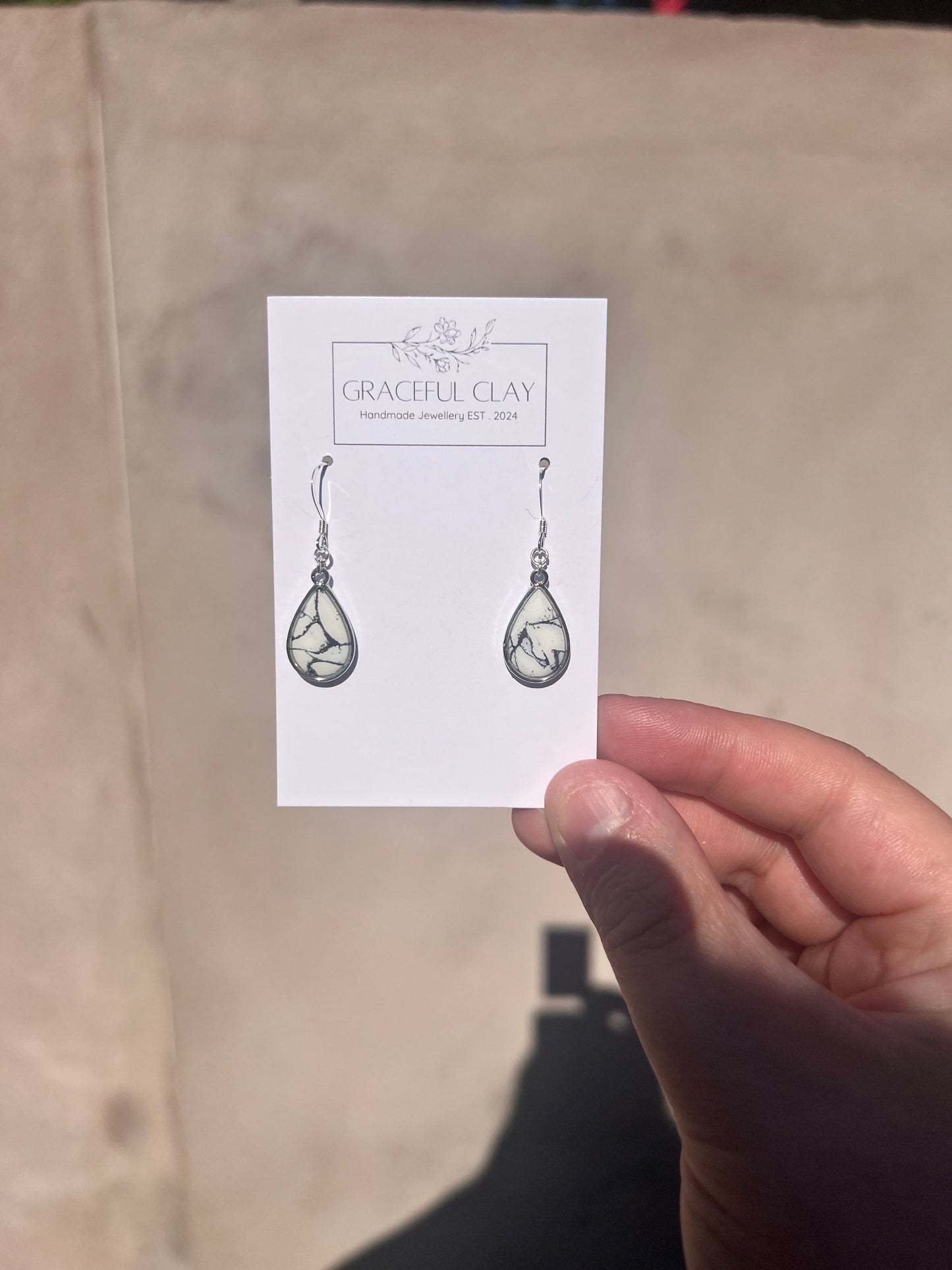 Silver oval white marble earrings