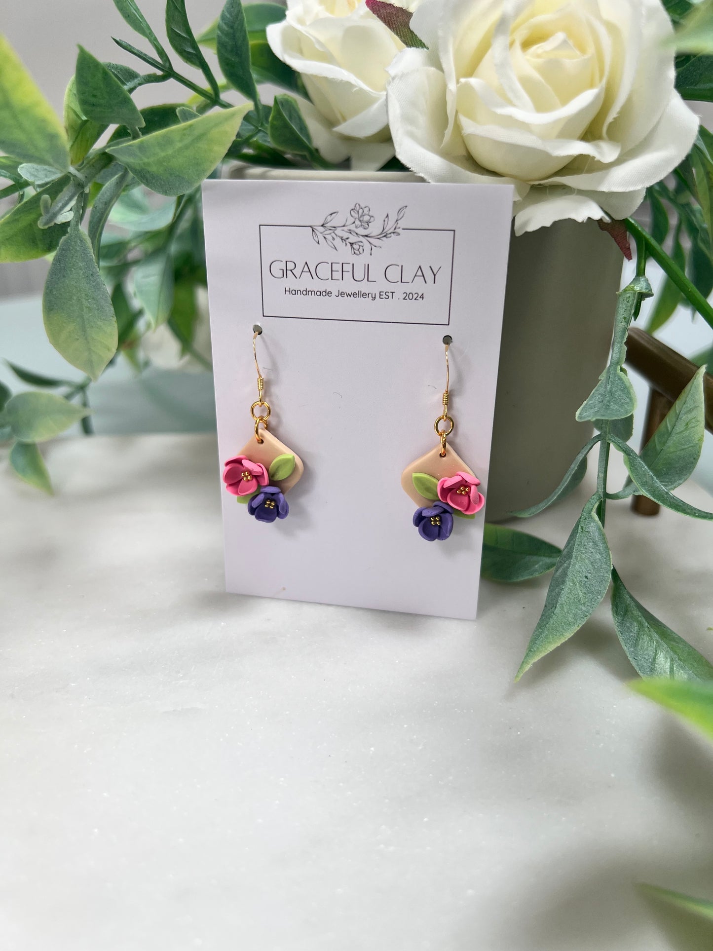 Small gold floral earrings