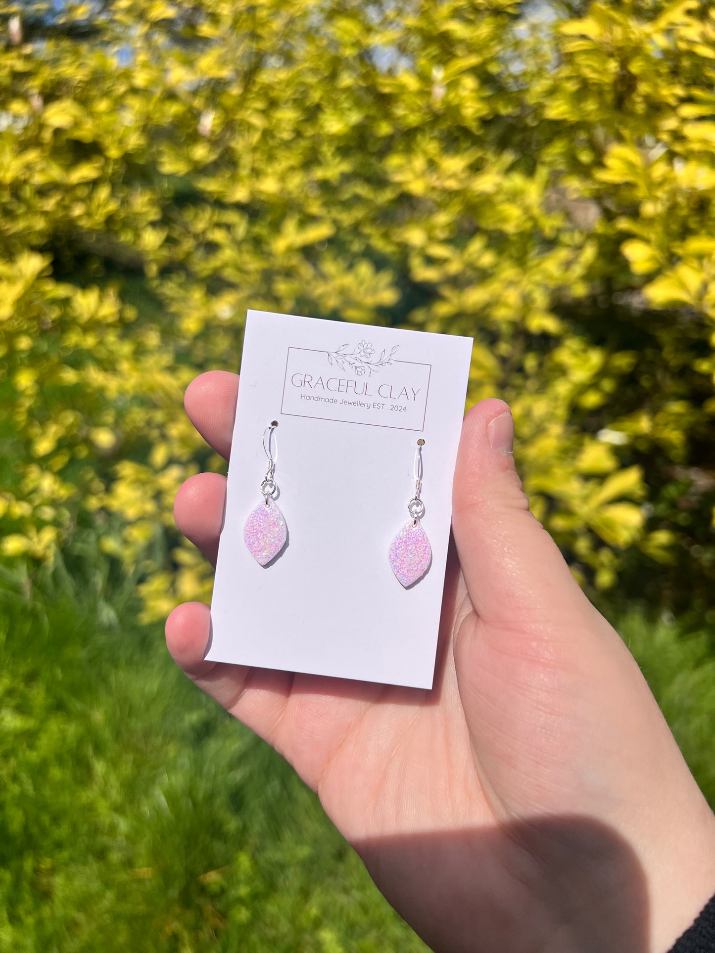 Teardrop pink & white glitter earrings