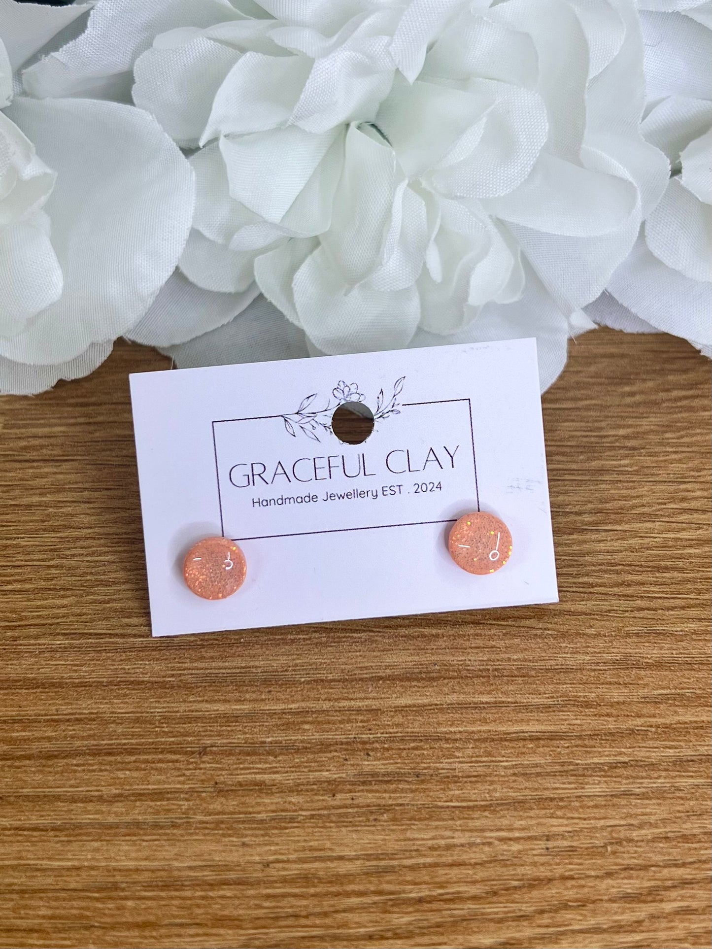 Peach glitter circle studs