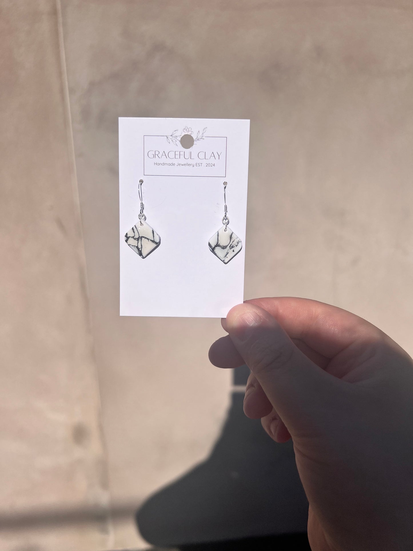 White marble small diamond shaped earrings