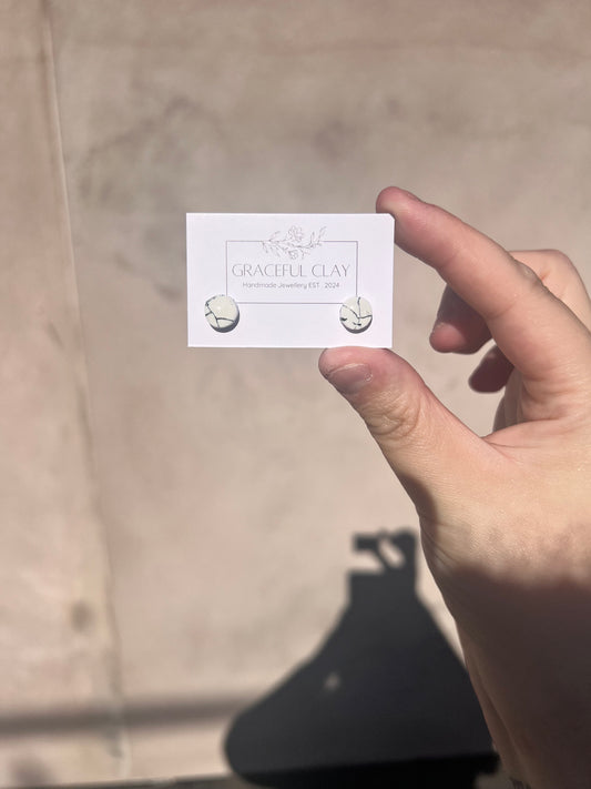 White marble studs