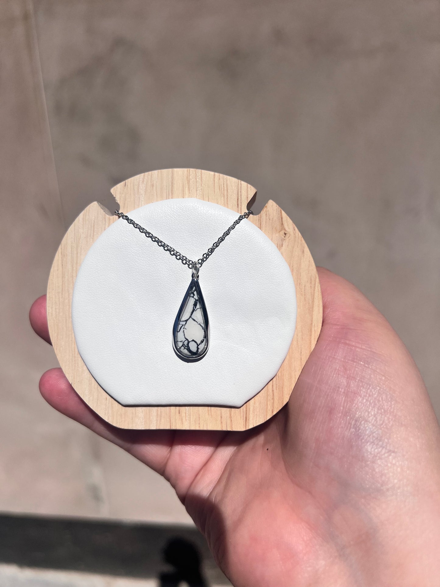 Large oval white marble silver necklace