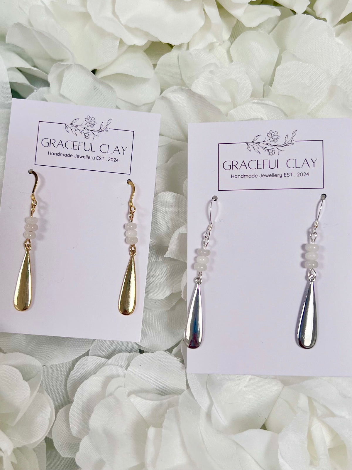 White bead pendant earrings