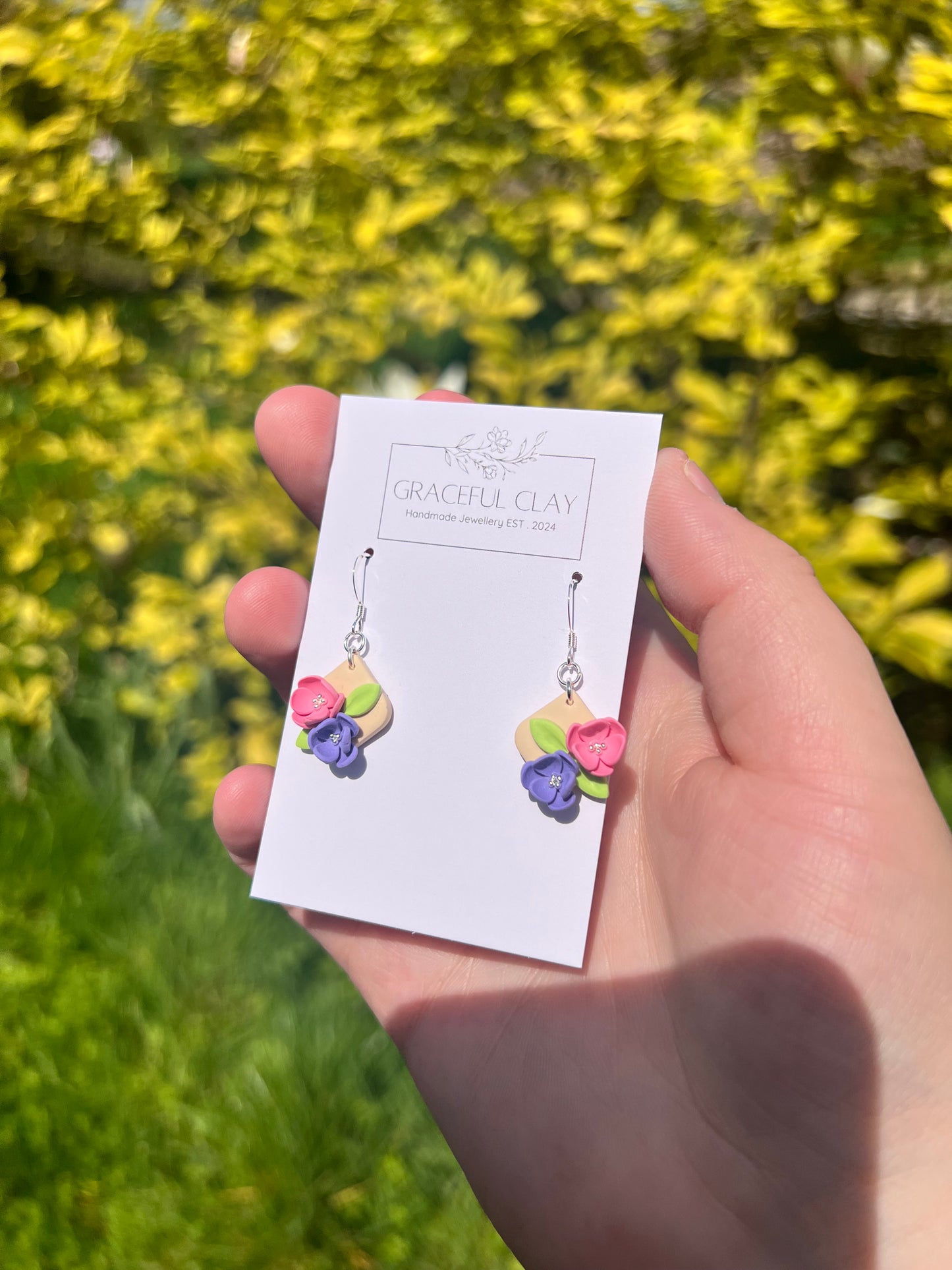 Small silver floral earrings