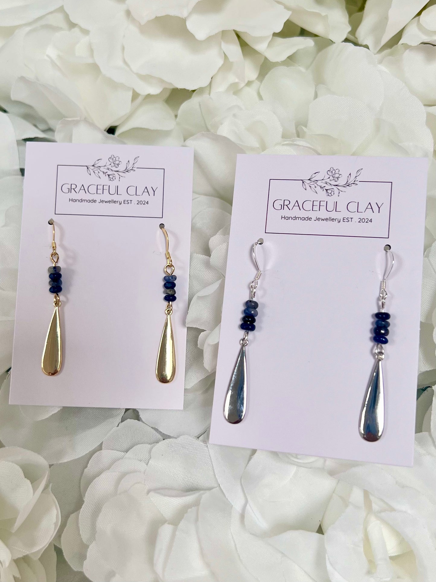 Navy beaded pendant earrings