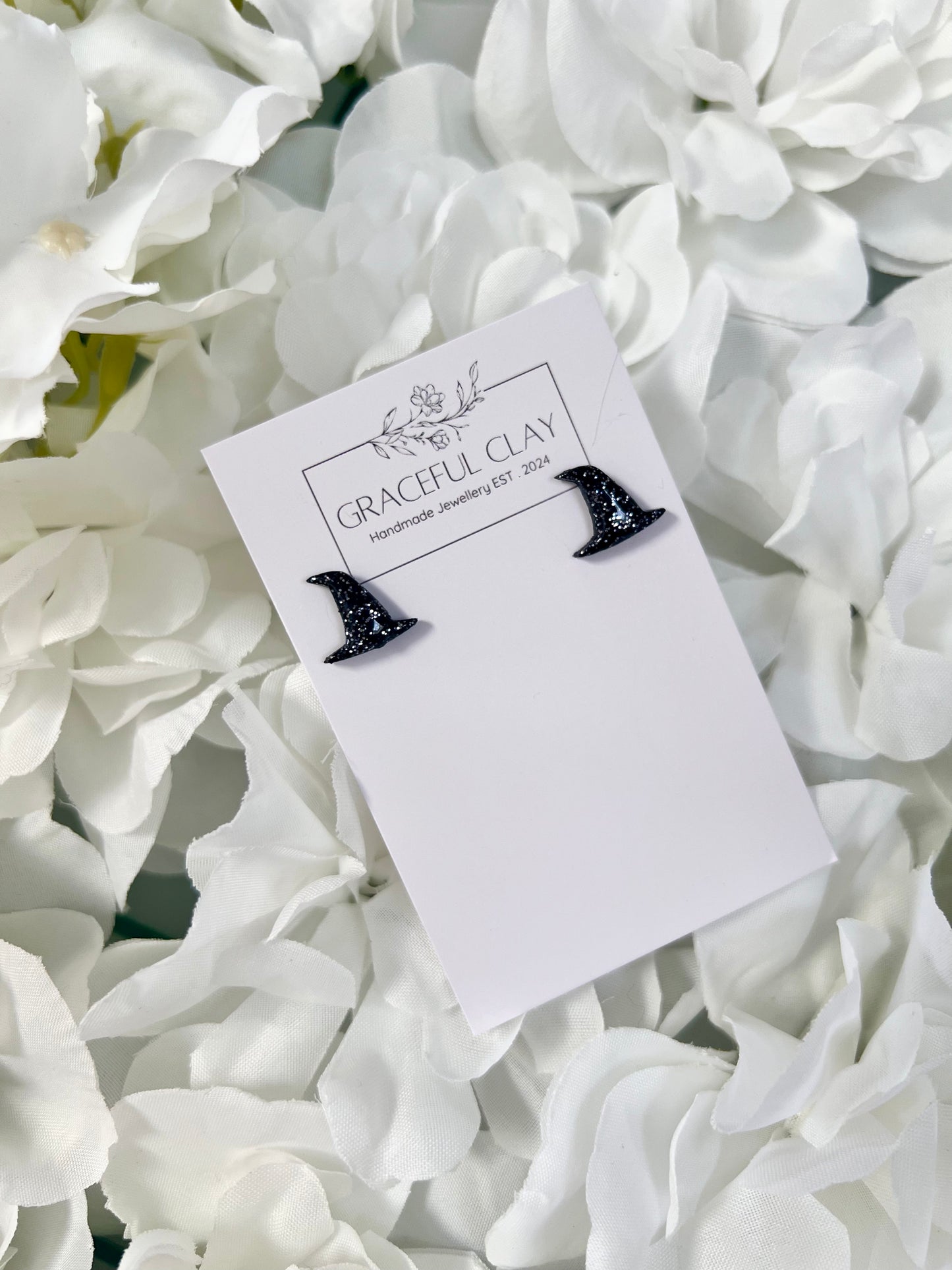 Black glitter witch hat studs
